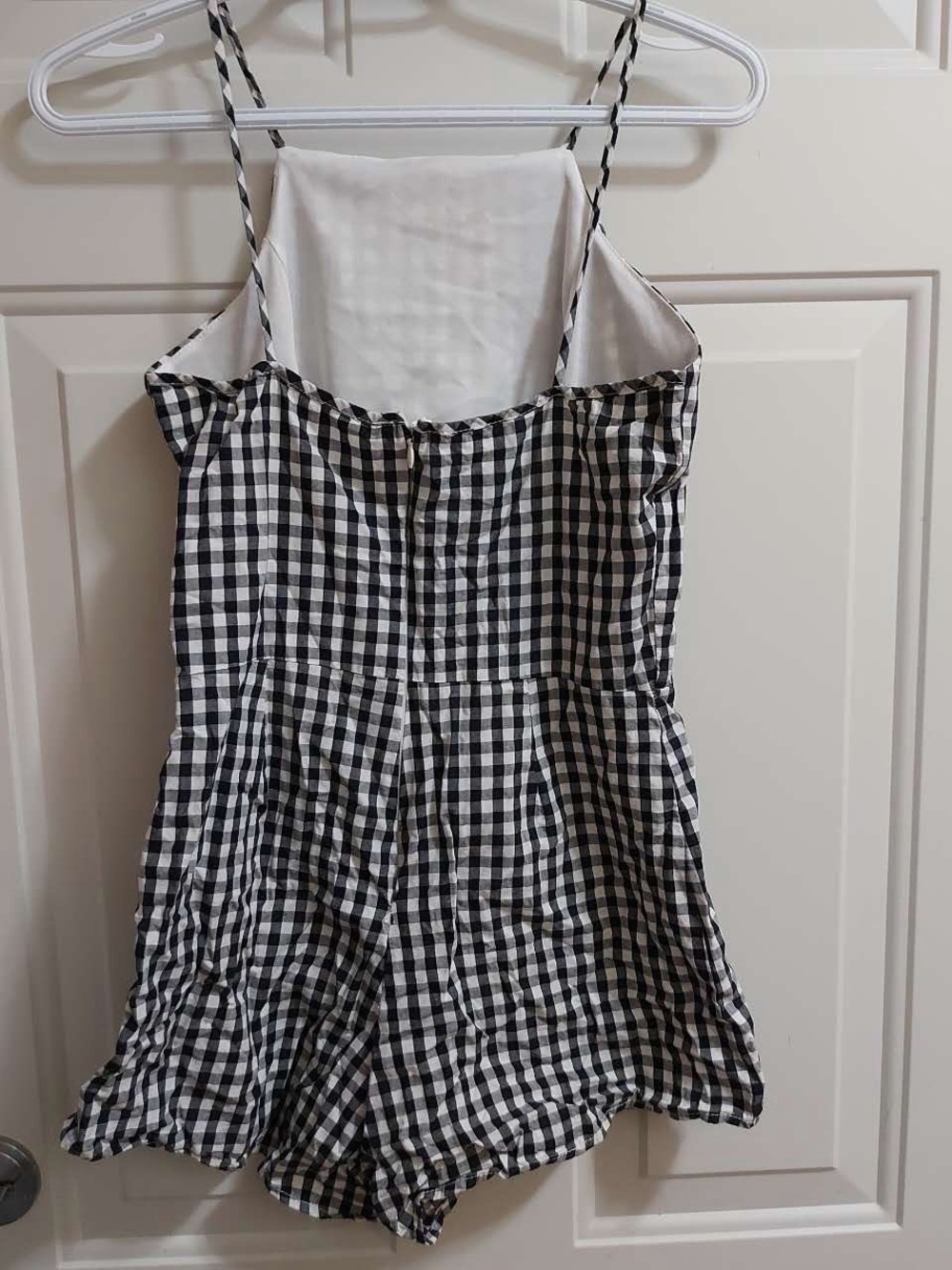 Black and white sleeveless gingham romper